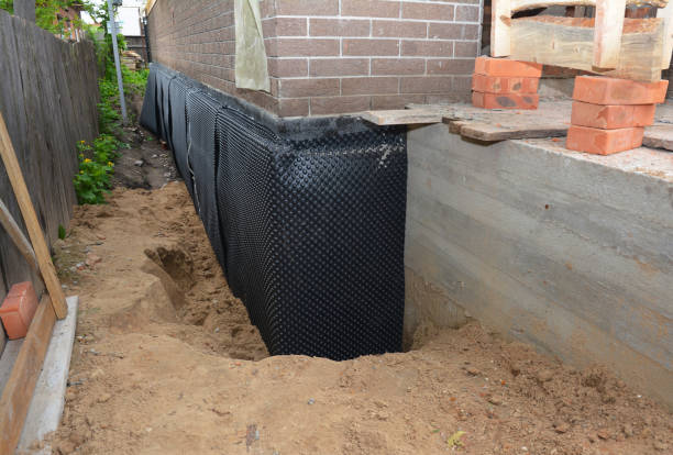 SJ Waterproofing Pros technician performing targeted Emergency Waterproofing assessment in Rochester, PA